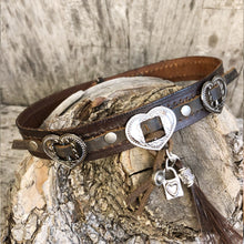 Load image into Gallery viewer, Heart conchos, charms &amp; horse hair tassel on boot bracelet
