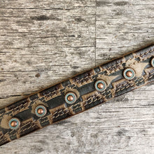 Load image into Gallery viewer, Western styled embossed leather boot bracelet with patinated copper spots.
