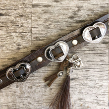Load image into Gallery viewer, Heart conchos, charms &amp; horse hair tassel on boot bracelet

