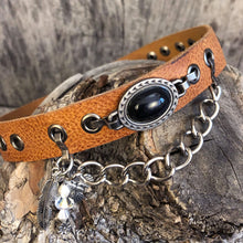 Load image into Gallery viewer, Whiskey leather boot bracelet with black cabochon style concho, chain and charms
