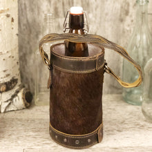 Load image into Gallery viewer, Rustic brown Cowhide Spirit Bag with braided trim and square cross concho
