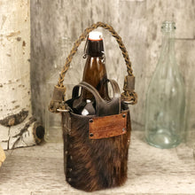 Load image into Gallery viewer, Home brew brindle cowhide Spirit bottle bag with buffalo nickele snap concho and rivet details
